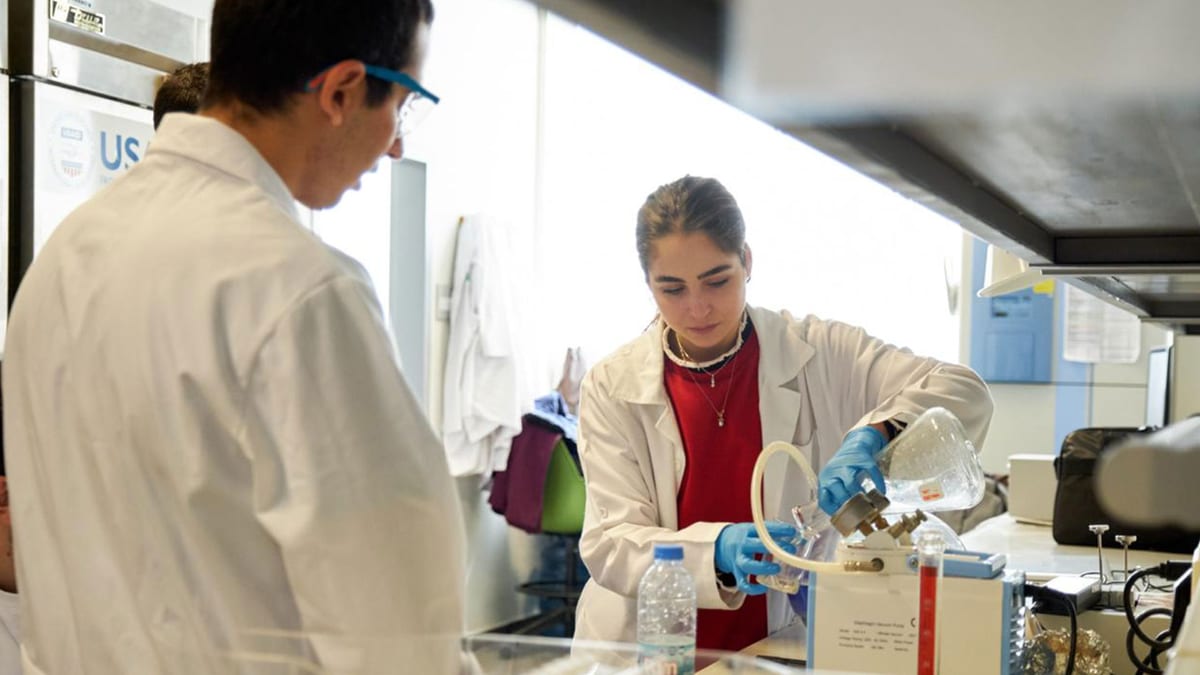 Chemical engineering students conduct a fluid-process laboratory experiment.