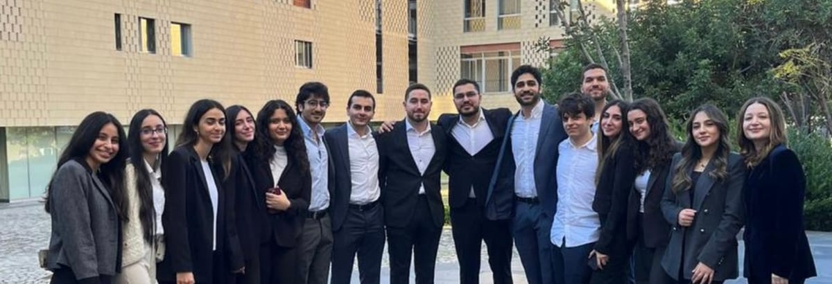 Industrial engineering and management students gather together on campus.